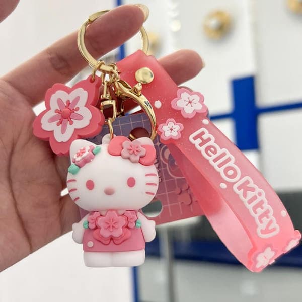 Rosa Sakura tegneserie nøkkelring, Kawaii søte nøkkelringer veske sjarm armbånd