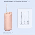 Miniatyrbillede 3 af 5: Philips Flosser Home Scaler bærbar elektrisk vandskyller HX3331