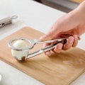 Miniatyrbilde 5 av 5: 1 Pakke Egg Cutter Rustfritt Stål Multifunksjon Egg Chopper Egg M