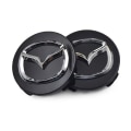 Miniatyrbillede 1 af 3: Nye 4x56mm Mazda Sølv Center Caps Logo Emblem Badge Hub Caps Ri
