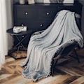 Pikkukuva 2 / 5: Fleece-peitto pompolla, mukava pehmeä Cashmere-peitto sohvalla