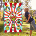 Miniatyrbilde 5 av 5: Carnival Clown Toss Game Banner med bønneposer for barn og voksne i karnevalsfestaktiviteter
