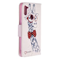 Pikkukuva 2 / 2: Wonderland Samsung Galaxy A11 / M11 etui - Ihana Kirahvi Lasit Päässä Multicolor