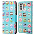 Miniatyrbillede 1 af 2: Wonderland Motorola Moto G52 flip etui - Ugler Multicolor
