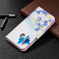 Pikkukuva 2 / 2: Wonderland Samsung Galaxy A20e kotelot - Sininen Perhonen ja Kukat Multicolor