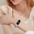Pikkukuva 2 / 2: Samsung Galaxy Fit e nahkainen kellonhihna hopeisella suojuksella - Maitotee Ruskea Beige