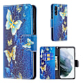 Miniatyrbillede 1 af 2: Wonderland Samsung Galaxy S21 FE Flip etui - Guld sommerfugle Blue