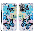 Miniatyrbillede 1 af 2: Wonderland Xiaomi Redmi Note 11T 5G / Note 11s 5g Flip Etui - Blå Sommerfugl Multicolor