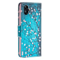 Pikkukuva 2 / 2: Wonderland Samsung Galaxy A04e Läppäkotelo - Plum Blossom Blue