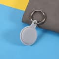 Pikkukuva 2 / 2: AirTags silikonisuojus avainrenkaalla - Harmaa Silver grey