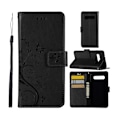 Miniatyrbillede 1 af 2: Samsung Galaxy S10 sommerfugle- og blomstertryk læder flip etui - Sort Black