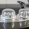 Pikkukuva 3 / 4: Selkeät Uuninpainikkeiden Suojukset Keittiön Uunin Kaasupainikkeiden Suojukset Helppo Asentaa Taaperolle