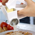 Miniatyrbillede 4 af 5: Multifunktionel Rotationsostrive, Rustfrit Stål Ostrive Skærer Slicer Smør Chokolade Rive