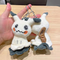 Miniatyrbillede 1 af 4: 2023 Ny Hot Kirby Grå Kawaii Rygsæk Hængende Nøgle Mode Figur Plyspuppe Børns Legetøj Mimikyu B