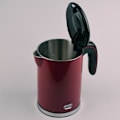 Miniatyrbillede 3 af 4: Elektrisk kedel i rustfrit stål 1,2L 1500W röd och svart