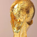 Miniatyrbild 2 av 4: 2022 års VM-replikat i displayfodral, hartskulptur,