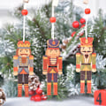 Miniatyrbild 1 av 5: 9 st julgranssmycken i trä med valnötsdesign C 9PCS