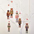Miniatyrbild 4 av 5: 9 st julgranssmycken i trä med valnötsdesign C 9PCS