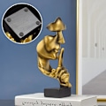Miniatyrbilde 3 av 3: Abstrakte skulpturer, Stillhet er gullskulptur Still mann