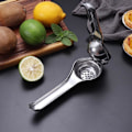 Miniatyrbillede 2 af 8: Granatæble Juicepresser i Rustfrit Stål - Manuel Citruspresser