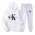 Pikkukuva 1 / 3: Naisten kaksiosainen treenihaalari pitkähihaisilla crop-housuilla. Valkoinen White XL