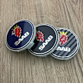 Pikkukuva 3 / 3: Svartrutiga Saab 63 mm 4-pack Saab Silver Navkapslar, One Size