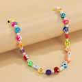 Miniatyrbild 4 av 5: Boho Smiley Flerskiktade Pärlhalsband Med Strand Armband, Leende Ansikte Blommor Hjärta Pärlor Pärla Stackabl(Slumpmässig Stil)