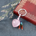 Pikkukuva 2 / 5: Luonnollinen ruusukvartsin sydänkristallirakkauskivi avaimenperä 7 Chakra Reiki Healing Crystal Gemstone Beads Tassel Keyring