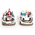 Miniatyrbillede 3 af 5: 2 stk. Forudbelyste Julelandsbyhuse med Lys og Musik, Lysende Harpikshus Snemand Julemand Harpiks