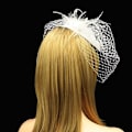 Pikkukuva 3 / 5: Naisten Fascinator-hattu Hääteejuhliin Päännauha Hiuspinni Hunnulla