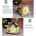 Miniatyrbild 4 av 5: Julbyhus i bymiljö, LED-julkulor i harts med varmt vitt ljus, batteridriven - juldekorationer (1 st, gul)
