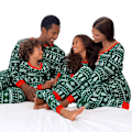 Pikkukuva 2 / 5: Joulupuku ja lumihiutale -kuvioiset pyjamaset Kid 6T