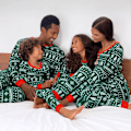 Pikkukuva 1 / 5: Joulupuku ja lumihiutale -kuvioiset pyjamaset Kid 6T