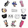 Pikkukuva 4 / 5: 18 kpl Kaws-kenkäkoristeita DIY-Crocs-kenkiin, sormuksiin, rannekkeisiin ja muihin