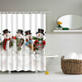 Miniatyrbillede 1 af 2: Badeværelsesbruseforhæng Shower Curtain Christmas - 4 snemænd White