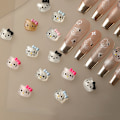 Miniatyrbillede 5 af 8: 10 stk Fine Flicker Katie Cat Nail Cartoon Accessories Mini Resi DZ781-04