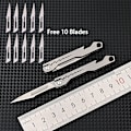 Miniatyrbild 1 av 8: Miniflasköppnare Skalpell Titanium Alloy G10 Handtag Vikbar O