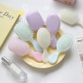 Pikkukuva 4 / 8: Mini Comb Air Cushion Comb Antistaattinen kampapäänahan hierontaharja Yellow Round