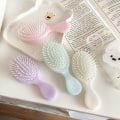 Pikkukuva 7 / 8: Mini Comb Air Cushion Comb Antistaattinen kampapäänahan hierontaharja Blue Square