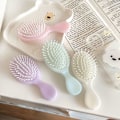 Pikkukuva 7 / 8: Mini Comb Air Cushion Comb Antistaattinen kampapäänahan hierontaharja Yellow Square