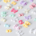 Miniatyrbild 5 av 8: 100 st/påse Mini rosett 3D e Nail Art dekorationer Glänsande pilbåge Orn SZ-601