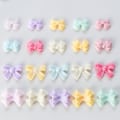 Miniatyrbild 3 av 8: 100 st/påse Mini rosett 3D e Nail Art dekorationer Glänsande pilbåge Orn SZ-601