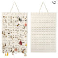 Pikkukuva 1 / 5: Seinälle kiinnitettävä korujen organizer , pystysuora Beige