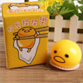 Miniatyrbilde 6 av 7: Klemmet Puking Egg Yolk Ball gul