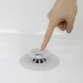 Miniatyrbild 3 av 3: Badpropp med hårstoppare / Stopp / Diskpropp Vit