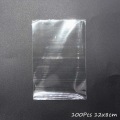 Miniatyrbild 7 av 11: 100 st Transparenta plastpåsar för godis Lollipop Kakförpackning Cellofanpåse Jul Bröllop Födelsedagsfest Presentpåse 100pcs 10x7cm