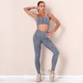 Miniatyrbillede 6 af 6: Europæisk og amerikansk vasket sømløs strikket yoga-sæt med hofter, hul sports-løbe træningsdragt til kvinder 6316 bra and trousers set-navy blue S