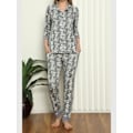 Miniatyrbillede 1 af 2: Brunt pyjamassæt til kvinder med lommer, knapper, lycra og blonde Green M