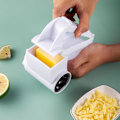 Miniatyrbillede 7 af 9: Hvidt mini roterende rivejern med håndtag til hvidløg, gulerødder og parmesanost