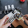 Miniatyrbillede 3 af 5: Kommerciel rustfrit stål roterende ostrivejern
